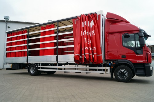 Zabudowa typu burto firana dla Amado-Trans na nadwoziu samochodu ciężarowego Iveco Eurocargo 160-320.